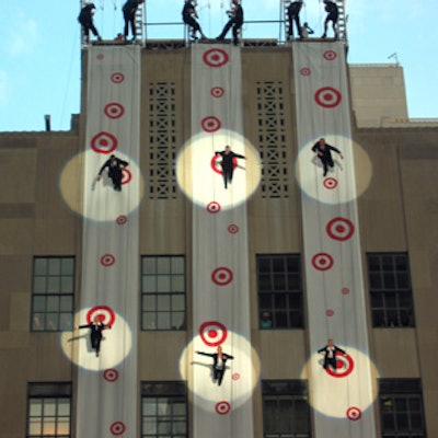 Acrobats from Munich-based events firm Jochen Schweizer stepped down a vertical runway at Target’s fall fashion show at Rockefeller Center.