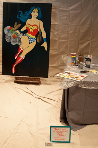 In a nod to the event's 'A Time For Heroes' name, artist Annie Preece worked on a Wonder Woman painting in real time at the fund-raiser.