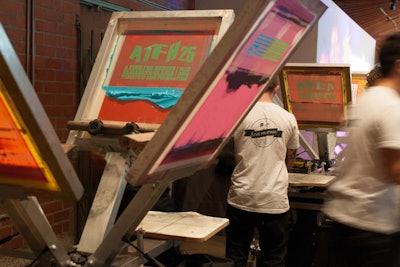 Ink Plus Cotton teamed up with Jake Glaser's Modern Advocate organization to offer guests screen-printed T-shirts.