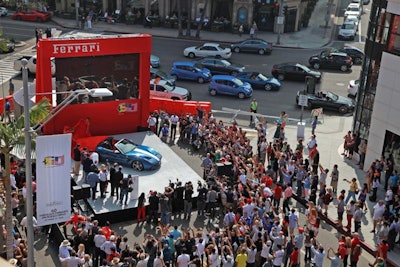 Giant screens were positioned at both ends of Rodeo Drive to broadcast the public event to spectators.