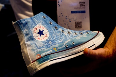 The finished shoes were covered in the New York cityscape and logos for Microsoft and Advertising Week. Microsoft gave away 25 pairs a day.