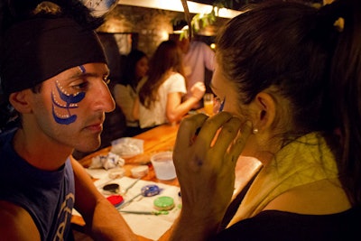 New York-based fitness trainer Jonathan Angelilli volunteered to paint guests’ faces with imagery inspired by the four elements.