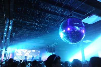 A massive disco ball provided by the Adrienne Arsht Center hung over the Mainframe stage's crowd, illuminating during headliner Jamie xx's set Saturday night.