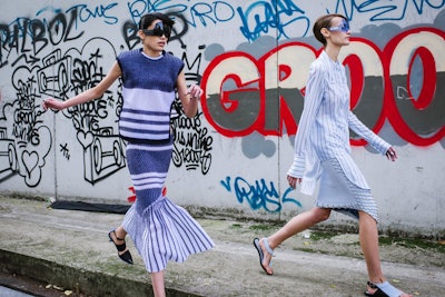 Kenzo creative heads Humberto Leon and Carol Lim used their skate park venue's natural surroundings (i.e. the graffiti) as a raw and gritty backdrop for their collection. The juxtaposition of aesthetics allowed the collection to be presented in a more vibrant manner.