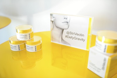 The event's hashtag, #DefyGravity, was used to promote the lifting properties of the brand's new TL Advanced Tightening Neck Cream.