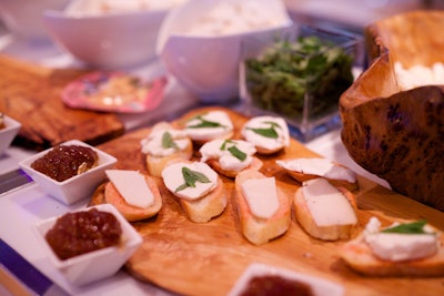 Guests were served a variety of Spanish-inspired pintxos, including a paella bar, sweet churros, and a cheese and Serrano ham station.