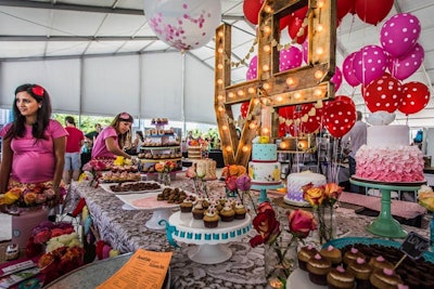 Nearby bakery Bunnie Cakes, known for its vegan, gluten-free, and sugar-free desserts, built a playful spread featuring balloons and cupcake towers with Scrabble letters that spelled 'Vegan.'