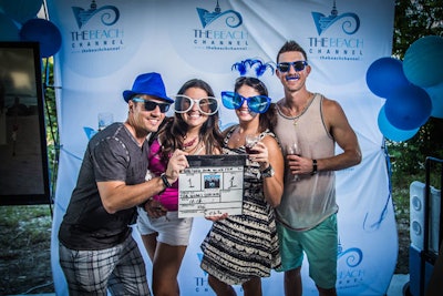 The Beach Channel's pop-up photo booth was a popular stop with props.