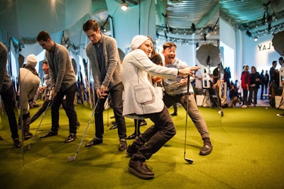 Billed as a selfie dream, the 'Swing Clinic' featured walls covered with mirrors positioned in a U shape, allowing guests to see their golf swing from every angle. A golf pro was on site to teach the perfect form, and Whosevent Photobooth took GIFs that guests could share in iPads. Printout stills of the GIF were also given as a memento.