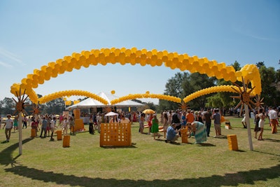 Monochromatic balloon arches defined a space within the event.