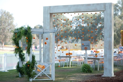 Marigolds dangled from arches, adding pops of color to the rustic look.