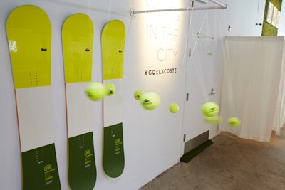 The interactive projection and wave pendulum wall, situated directly across from the bar, mirrored the projection of white Lacoste golf balls on the opposite wall. With the wave pendulum adjacent to the swing clinic, another layer of discovery was provided in the experience.