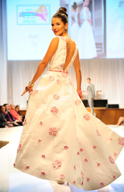 Designer Alan Ta's dress had flowery pink accents made from limited-edition Pink Embossed Cashmere. The pink toilet paper is sold throughout Breast Cancer Awareness Month, and part of its proceeds are donated to the Canadian Breast Cancer Foundation.