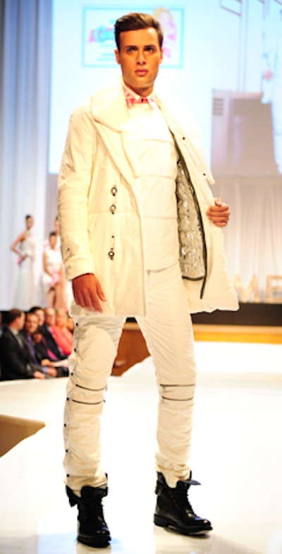 Designer Ken Chow crafted casual white menswear and added a bright pink shirt collar to the ensemble.