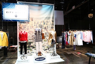 The clothing and other products were displayed in three thematic vignettes, each representing a different month in the spring season. One section, dubbed 'City Break,' held Old Navy's collection of early spring items—described as a West Coast prep collection inspired by weekends in the city—and props associated with urban environments.
