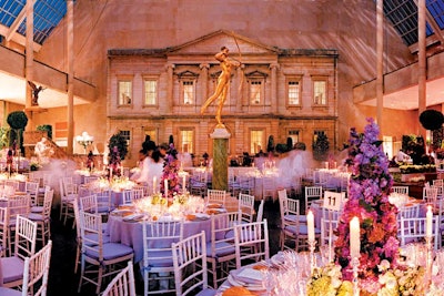 In 2004, the gala paid homage to the 'Dangerous Liaisons: Fashion and Furniture in the Eighteenth Century' exhibition with Victorian-esque topiary trees and conical-shaped centerpieces featuring colorful blooms like lilacs.