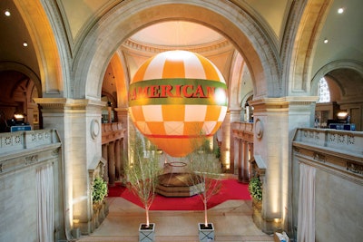 Nathan Crowley's exhibit design for 2010's 'American Woman: Fashioning a National Identity' featured panorama rooms, similar to those at the turn-of-the-century world's fairs. Inspired by the Chicago World's Fair of 1893, Crowley and Raúl Àvila, who oversaw the event's decor, inflated a 35- by 40-foot hot-air balloon in the Great Hall to greet guests.