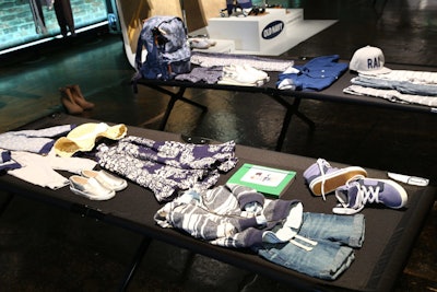To emphasize the on-the-road theme, items in the section were displayed on camping cots alongside journals and backpacks.