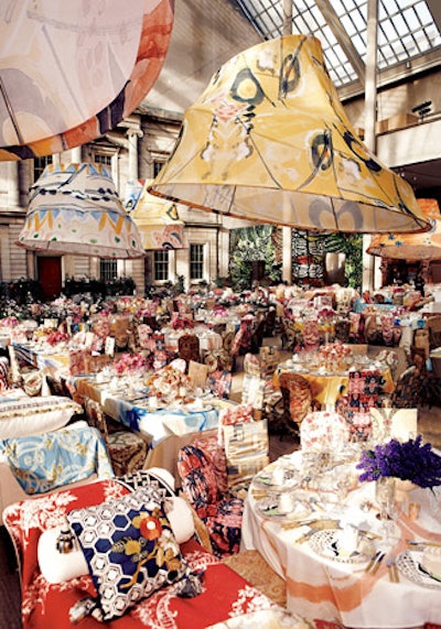 In addition to the eccentric peacock display, the 'Poiret: King of Fashion' exhibition and the designer's love of prints inspired the gala's dining decor in the Charles Engelhard Court, which included swinging lanterns, colorful cushions, and mismatched floral centerpieces.