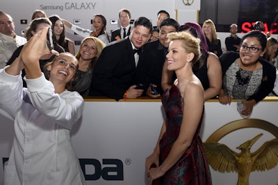 Samsung brand ambassadors snapped shots of fans and Mockingjay stars like Elizabeth Banks (pictured).