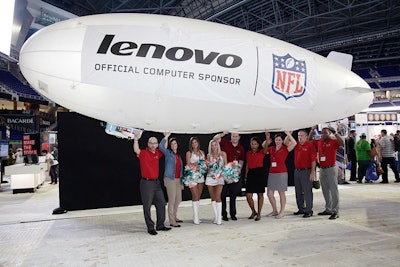 The Lenovo team posed with a blimp that floated throughout the stadium releasing coupons and prize vouchers.
