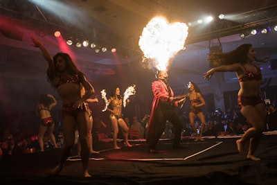Flambeaux Fire performed alongside six dancers to Pitbull's song 'Fireball' before dinner.
