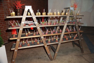 Wood framing was a design motif that echoed throughout the event, including in a drink serving station.