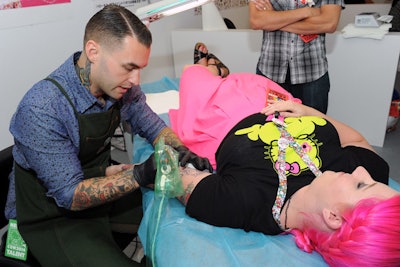 Local tattoo artists gave fans free permanent Hello Kitty tattoos on a first-come, first-serve basis.