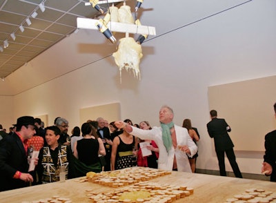 In 2010, food artist Jennifer Rubell created a one-night-only exhibition called 'Icons' for the Brooklyn Museum. The food-focused exhibit was designed to be interactive and serve as the meal for the art institution's annual Brooklyn Ball. Among the pieces Rubell created were lifesize cheese heads that hung from the ceiling, with heat guns slowly melting the sculptures onto a bed of crackers below. The inspiration? Artist Bruce Nauman, whose work includes sculptures of heads.