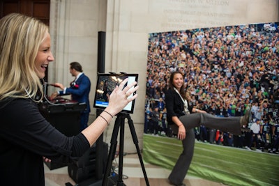 NetApp used a photo opportunity of a large stadium backdrop and football props to tie together its sponsorship of the N.F.L. with the FedTalks activation.