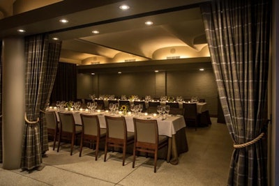 40 guests seated at long rectangular tables