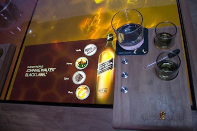 As a Johnnie Walker 'Master of Whisky' talked about the different flavor palates of the Black and Double Black labels, the table displayed the ingredients and aromas in the different types of scotch.