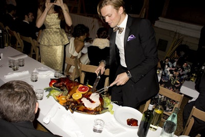 Each table was presented with a suckling pig, which guests carved themselves.