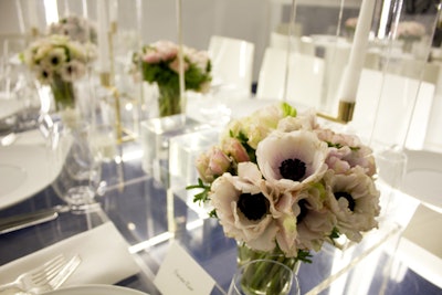 Blush-colored anemone flowers added a soft, delicate contrast to the sharp edges of the geometric centerpieces.