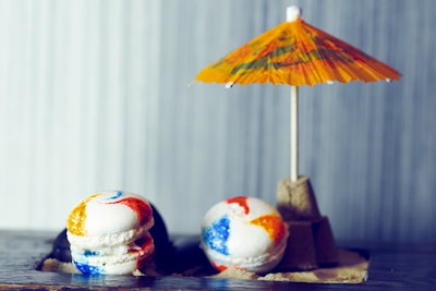 This past summer, Chicago's Moto Restaurant created a new dessert inspired by the season: coconut macarons painted to look like beach balls. Chocolate seashells, pineapple starfish, and brown sugar sand completed the plate.