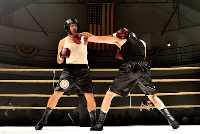 Four sanctioned bouts—lightweight, welterweight, middleweight, and heavyweight—were the centerpiece of the Schlitz Bouts. American menswear label the Brooklyn Circus designed the boxers' trunks and released a commemorative apparel collection, the Brown Bottle Boxing Club collection, available online and in its stores.