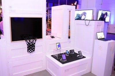 Identical crates were turned on one of three sides to alternate heights for different product displays. Bigger objects were placed at seating height; others were placed at table height at 30 inches or bar height at 42 inches. Black packing foam was custom cut to fit the top of the crates, and similar product labels were applied to identify each object.