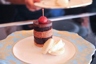 At the launch party for President’s Choice Black Label in September 2011, Allyson Meredith Bobbitt and Sarah Bell, pastry chefs and owners of Bobbette & Belle, served dark Venezuelan chocolate cake on edible plates made out of sugar. The two chefs molded each plate individually and hand-painted them with unique designs on site at Toronto's Neubacher Shor Contemporary Gallery.