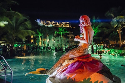 On Halloween night, a 'Black Magic' pool party was held at the resort's Coqui Water Park. Five DJs entertained the guests through the night, and island-theme Halloween decor, including models in mermaid costumes, set the scene.