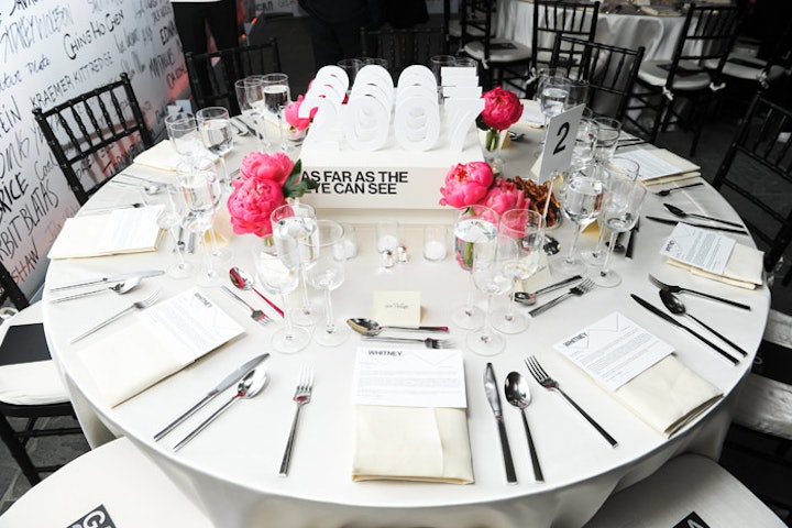 Peonies in pink tones added a pop of color to the tables' black-and-white decor.