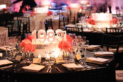 Sculptural representations of different years in the life of the Breuer building, along with the names of that year’s exhibitions, served as the dining room centerpieces.