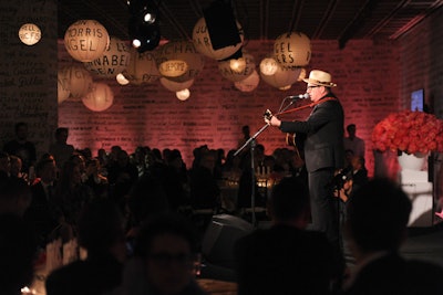 Elvis Costello performed during dinner. In addition to the artists in attendance, gala guests included Nigel Barker, Henry Louis Gates, Jr., Padma Lakshmi, John McEnroe, and Hilary Rhoda.