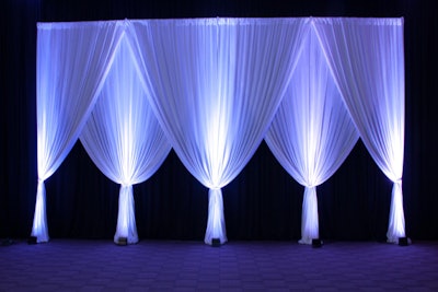 Black and white poly drape stage backdrop