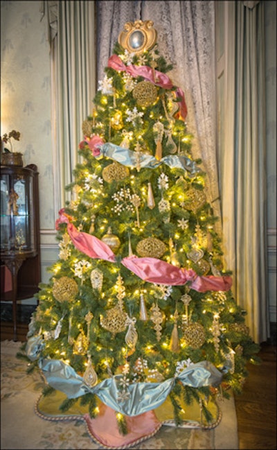 Julia West Home, which creates home products, gave its tree a classic look inspired by the 1910s. The tree was decked with ribbons in pink and pale blue, as well as gilded ornaments.