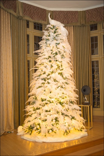 William Fulghum Design Associates decorated a tree inspired by the 1920s. The all-white decor included hundreds of feathers.