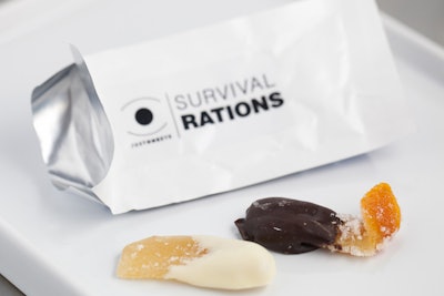 Candied orange and ginger slices dipped in white and dark chocolate were served in 'seal and peel' envelopes. In total, more than 3,000 'rations' of food were prepared and served by Love Catering. 'The food had to be packaged to withstand the environment while still being sophisticated,' said Clausz.