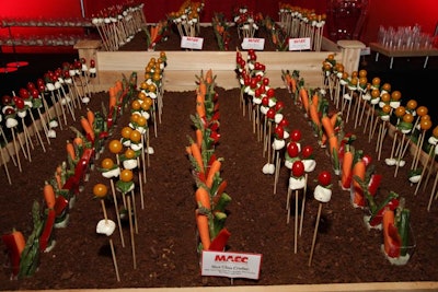At the grand opening of the Miami Airport Convention Center in April 2012, a 'garden' was created out of toasted pumpernickel bread for dirt and included planted baby carrots, asparagus spears, and zucchini, as well as baby tomatoes and buffalo mozzarella flowers.