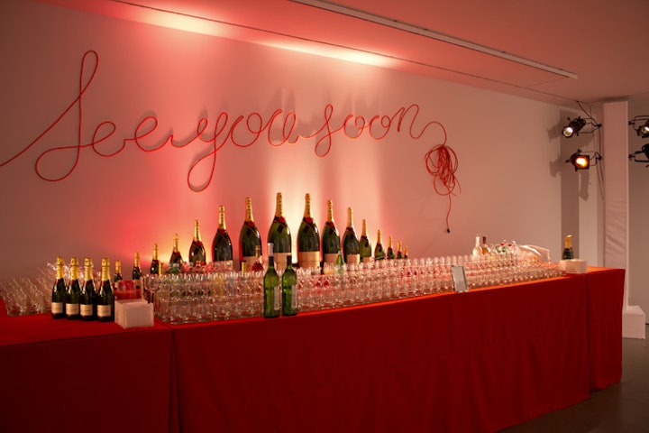 Playing off the moving theme, Stark created construction-inspired wall art, shaping utilitarian extension cords into closing phrases, such as 