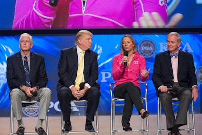 Donald Trump and golfer Annika Sörenstam participated in a panel discussion on the state of the golf industry, which took place in a large presentation theater adjacent to the trade show floor.