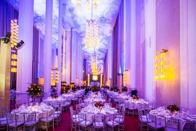 After the performance, the lighting in the foyer changed to an electric blue for dinner and dancing.